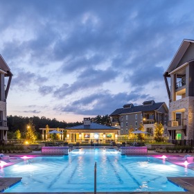 Swimming Pool Large resort style pool with large pool deck at night